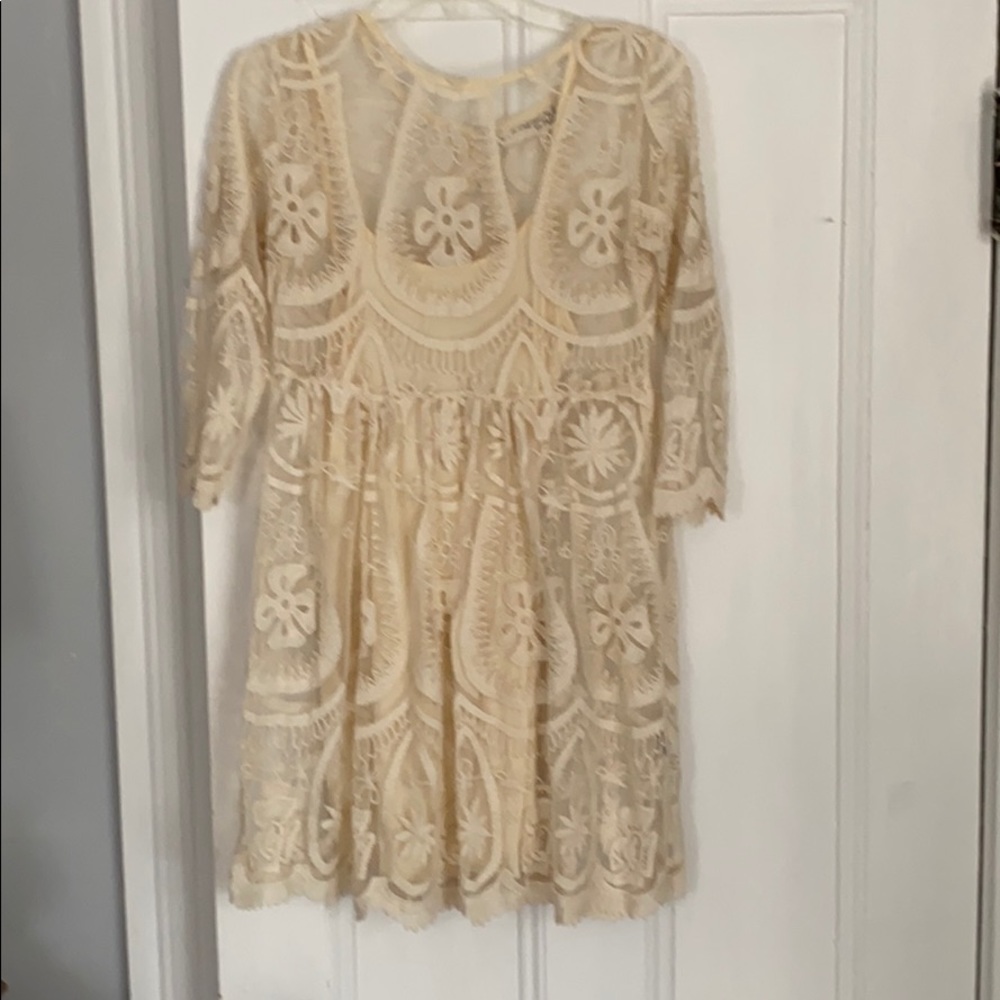 Cream/ivory lace dress.